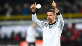 Podolski na despedida da seleção alemã: atacante marcou 49 gols pelo Die Mannschaft (Foto: AFP)