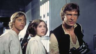 Mark Hamill, Carrie Fisher e Harrison Ford em Star Wars (1977)