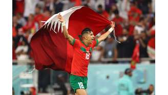 Jawad El Yamiq comemora uma das vitórias de Marrocos na Copa do Mundo