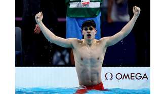 Zhanle Pan ao conquistar o ouro nos 100m 