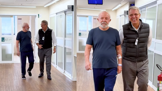 Presidente Lula caminha pelos corredores do hospital após deixar a UTI