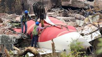 Destroços do avião da Air India cuja queda matou 260 pessoas