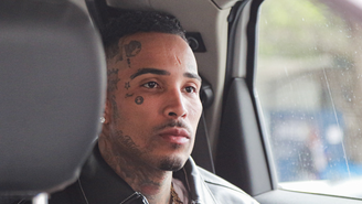 Gato Preto ao chegar em delegacia na manhã desta quarta-feira, 20