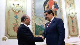 Enviado especial da China, Qiu Xiaoqi e Nicolás Maduro