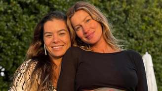 Gisele Bündchen aparece com a barriga de grávida pintada