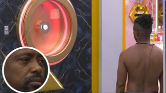 'BBB 26': Desistiu? Boneco chora muito e fica olhando Botão da Desistência