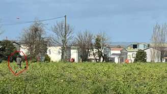 Família acredita que a pessoa de costas, circulada em vermelho na imagem, é Vitória Barreto