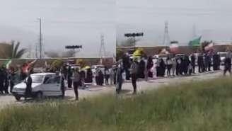 Corrente humana em torno da usina termoelétrica de Kazeroon, no Irã