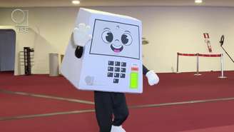 Descubra o significado da mascote Pilili, lançada pelo TSE para os 30 anos da urna eletrônica, e o seu papel nas eleições de 2026