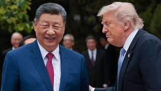 Visita de Trump a China foi definida mais por uma retórica calorosa e simbolista do que por anúncios concretos