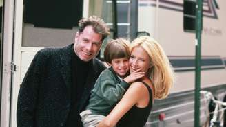 John Travolta e Kelly Preston com o filho Jett Travolta, em 1997
