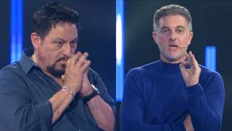 José Pedro e Luciano Huck no The Wall, quadro do Domingão (Reprodução/TV Globo)