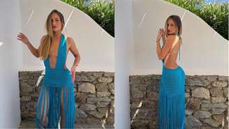 Bruna Griphao de vestido azul.
