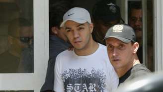Belo saindo da prisão em 2004