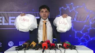 "Fujões": ausência de Lula e Flávio Bolsonaro em debate na Band é alvo de críticas
