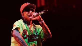 Tyga se apresenta no palco durante a turnê Tha Carter VI, de Lil Wayne, em setembro de 2025