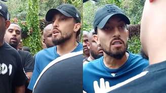 Alex Telles sendo intimidado por torcedores do Botafogo 