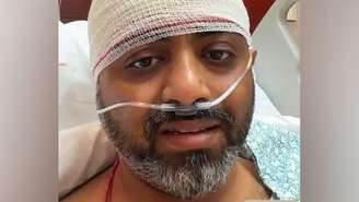 O capitão Smit Machchhar com uma faixa na cabeça no hospital