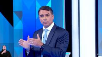 Flávio durante debate da Globo nesta sexta-feira, 23