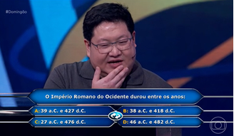 O médico infectologista Sidney Matsuoka no 'Quem Quer Ser Um Milionário?' neste domingo, 27