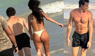 2026 começou romântico! Bruna Marquezine e Shawn Mendes são flagrados correndo para o mar de mãos dadas: 'Apaixonados mesmo'.