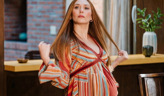 'WandaVision' está grávida! Aos 37 anos, Elizabeth Olsen exibe barriga da primeira gestação e reinventa na vida real o final feliz da Feiticeira Escarlate da Marvel.
