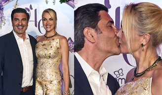 Recém-casados, Ana Hickmann e Edu Guedes dão beijão em festa e apresentadora aposta em look poderoso com jacquard e joias verdes.
