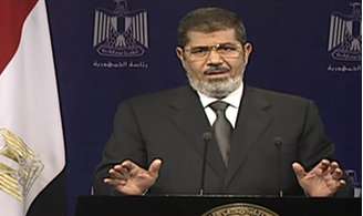 O presidente do Egito, Mohamed Mursi, discursa à nação em meio à crise política: defesa da legitimidade do mandato