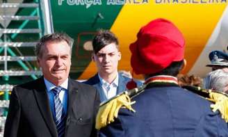 Jair Bolsonaro chega a Santa Fé acompanhado pelo filho Jair Renan.