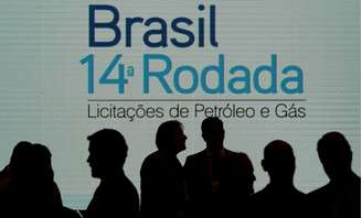 Representantes de companhias participam da 14ª Rodada de Licitação de blocos exploratórios de petróleo e gás no Rio de Janeiro, Brasil
27/09/2017
REUTERS/Bruno Kelly
