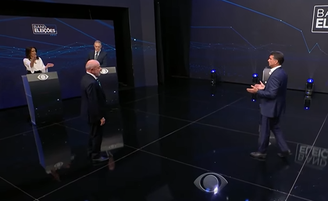 Flávio Bolsonaro (PL) e Lula (PT) se enfrentam no debate da Band neste domingo, 18