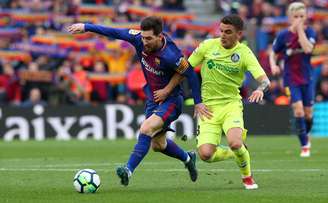 Messi teve trabalho para superar a forte marcação do Getafe, mesmo jogando em casa.