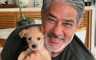 Bonner com Bruce William, um dos mascotes da família: o apresentador tem rotina discreta quando está longe da TV