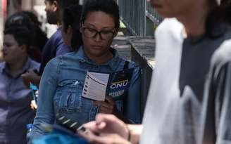 WS SÃO PAULO- 05/10/2025 - CONCURSO NACIONAL UNIFICADO - CIDADES - Abertura dos potões na FMU Vergueiro As provas do Concurso Nacional Unificado (CNU) 2025 serão aplicadas neste domingo (5). O exame, conhecido como o Enem dos concursos?, vai selecionar candidatos para cargos em diversos órgãos públicos federais. . FOTO:Werther Santana/Estadão