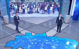 Flávio Bolsonaro e Lula durante debate na TV Globo