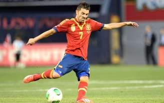David Villa em ação pela seleção espanhola, onde conquistou uma Eurocopa e uma Copa do Mundo (AFP)