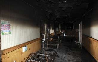 <p>Incêndio no hospital deixou salas e corredores com muitos danos. Pelo menos 20 pacientes e uma enfermeira morreram no local</p>