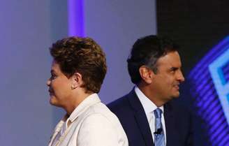 Fotografía combinada de la candidata presidencial Dilma Rousseff y su rival Aécio Neves luego de votar en sus respectivos locales. Imagen de archivo. 5 octubre, 2014. El candidato opositor favorable a los negocios Aécio Neves ha ganado respaldo y compite voto a voto con la presidenta izquierdista Dilma Rousseff antes de la segunda vuelta de la elección presidencial del 26 de octubre, mostraron el jueves dos nuevos sondeos.