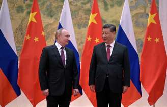 Putin e Xi Jinping durante encontro em Pequim