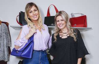 A apresentadora Lívia Andrade com a empresária Carla Folloni: unidas pela paixão por moda