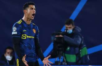 Cristiano Ronaldo decidindo o jogo contra o Villarreal na Champions League (Foto: JOSE JORDAN / AFP)