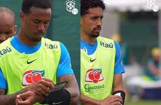 Gabriel Magalhães e Marquinhos com acessório durante treino