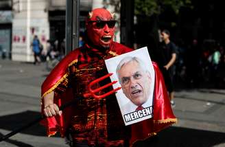 Manifestante protesta contra presidente do Chile, Sebastián Piñera
29/10/2019
REUTERS/Jorge Silva