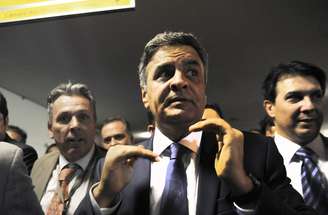 <p>Aécio Neves disse que nova equipe econômica busca recuperar "a credibilidade perdida"</p>
