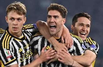 Isabella Bonotto/AFP via Getty Images - Legenda: Vlahovic foi o grande destaque na vitória da Juventus sobre a Atalanta -