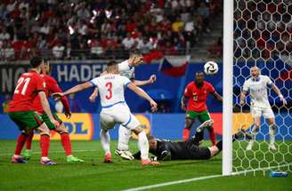 Christophe Simon/AFP via Getty Images - Legenda: Momento do primeiro gol de Portugal na vitória sobre a República Tcheca na Euro 2024 -