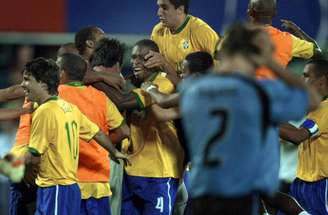 Jogadores do Brasil comemorando a classificação contra o Uruguai –