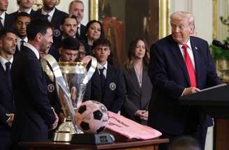 WASHINGTON, DC – MARCH 05: (L-R) Lionel Messi of Inter Miami CF shakes hands with U.S. President Donald Trump as Inter Miami CF CEO and Managing Owner Jorge Mas looks on during an event celebrating the 2025 MLS Cup Champions Inter Miami CF in the East Room of the White House on March 05, 2026 in Washington, DC. Inter Miami defeated the Vancouver Whitecaps 3-1 to win their first MLS Cup championship. (Photo by Win McNamee/Getty Images)