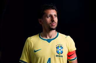 Marquinhos ao lado do diretor de Comunicação da CBF, Fábio Seixas –