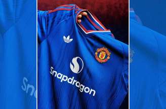 Brasileiro Matheus Cunha posa com a nova camisa do United –